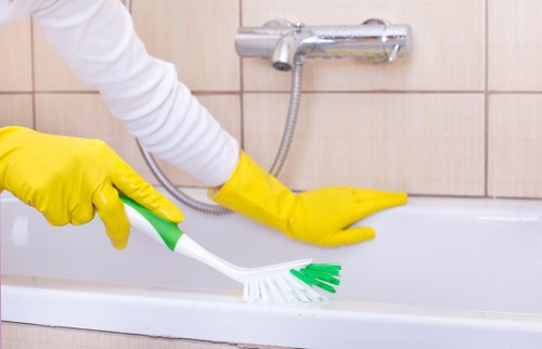 Kitchen surfaces being cleaned during domestic cleaning